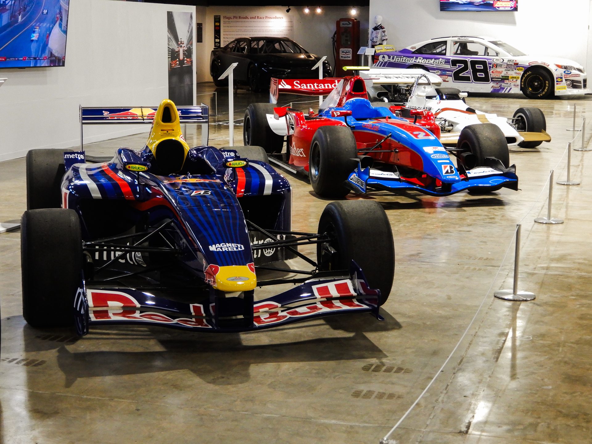 Racing hall — Red Bull F1 and Santander Formula cars